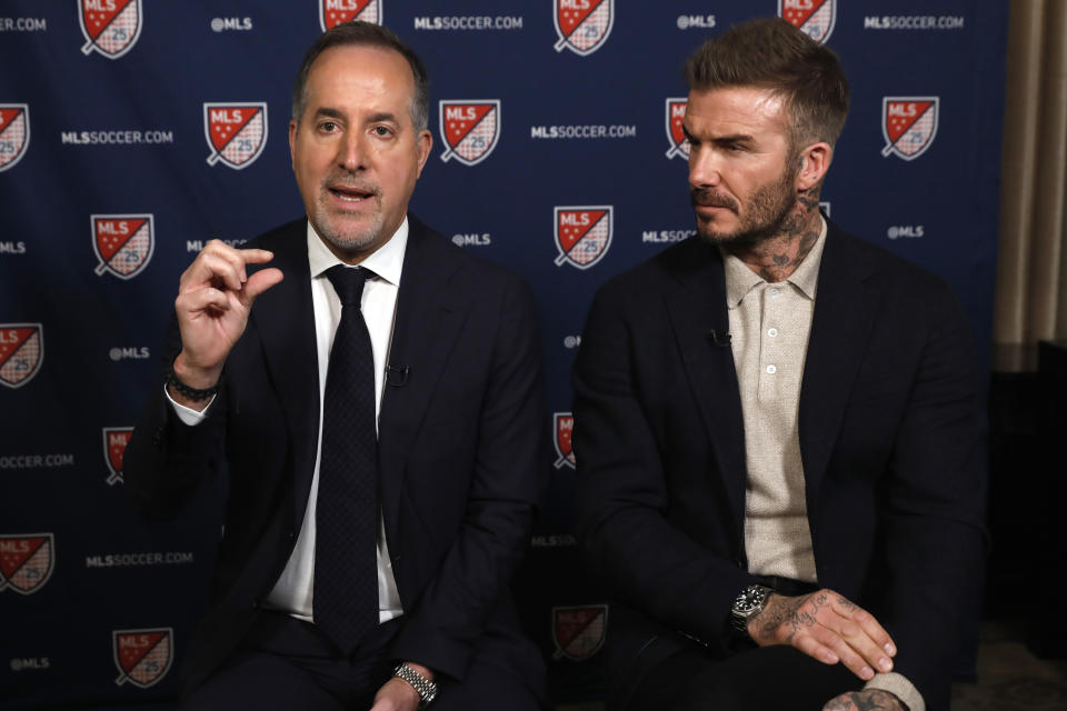 Inter Miami CF co-owners Jorge Mas, left, and David Beckham, are interviewed during the Major League Soccer 25th Season kickoff event, in New York, Wednesday, Feb. 26, 2020. (AP Photo/Richard Drew)