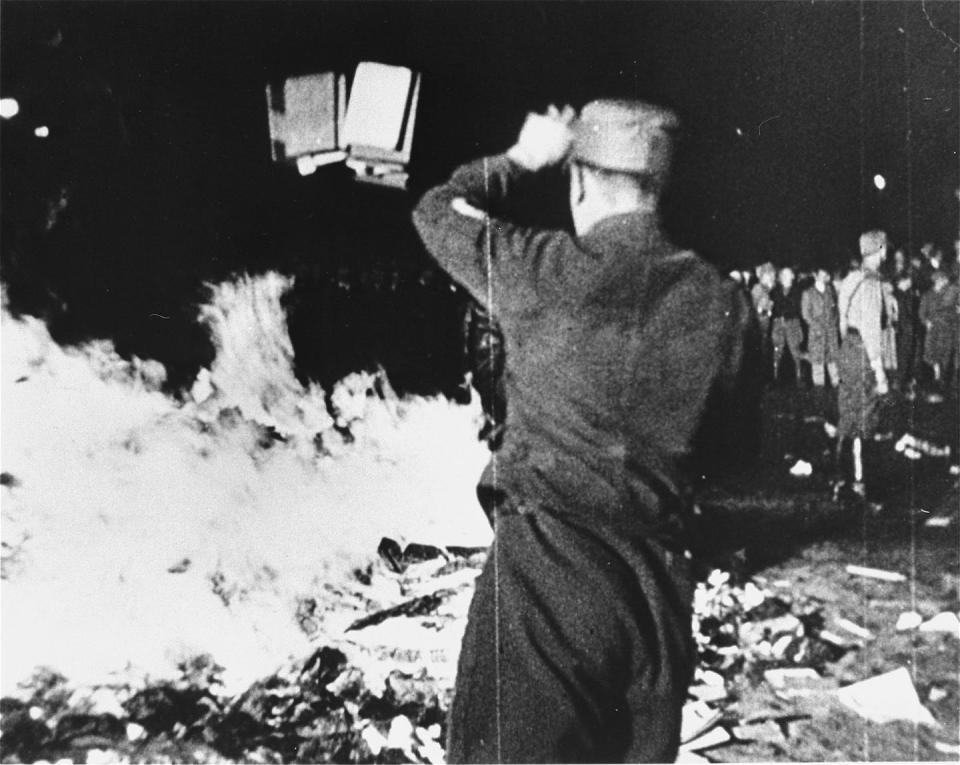 Members of the Nazi party confiscated and burned ‘un-German’ books, including those from the Institut für Sexualwissenschaft. <a href="https://collections.ushmm.org/search/catalog/pa26364" rel="nofollow noopener" target="_blank" data-ylk="slk:United States Holocaust Memorial Museum, courtesy of National Archives and Records Administration, College Park;elm:context_link;itc:0;sec:content-canvas" class="link ">United States Holocaust Memorial Museum, courtesy of National Archives and Records Administration, College Park</a>