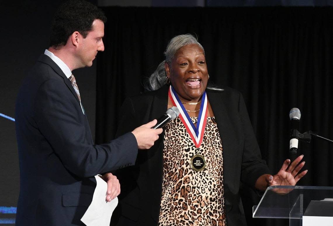 2022 inductee Connie Gooch, right, talks about her time playing on the winning Hoover Girls basketball team at the 63rd Annual Fresno County Athletic Hall of Fame Enshrinement Night Wednesday, Sept. 21, 2022 in Fresno. The event was also the grand opening in Athletic Hall of Fame’s new location inside the Save Mart Center at Fresno State. ERIC PAUL ZAMORA/ezamora@fresnobee.com