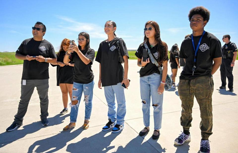 Family, friends, and students from the lowrider bike club in the Olathe school district watched as Erik Erazo prepared for his ride with the U.S. Navy Blue Angels. Tammy Ljungblad/tljungblad@kcstar.com