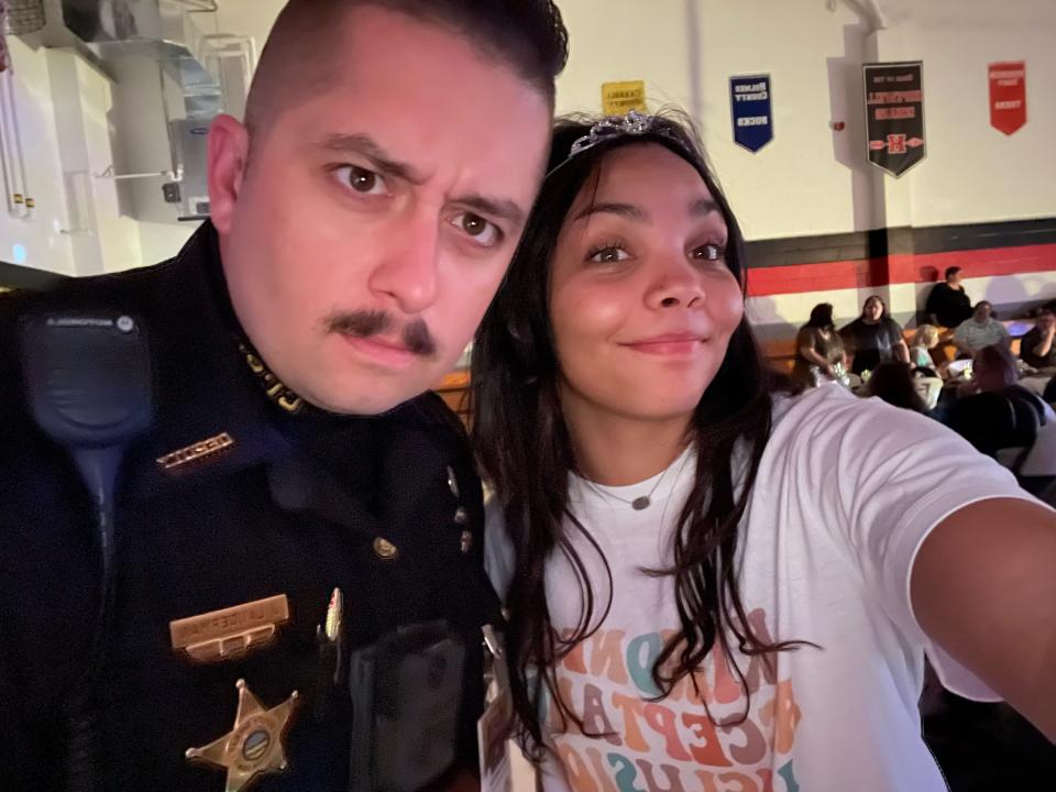 River View Resource Officer Justin Landerman and Maliya Williams take a goofy selfie at a special needs homecoming dance Williams planned as a senior project. Another project has her managing Landerman's official Instagram account as the district's resource officer.