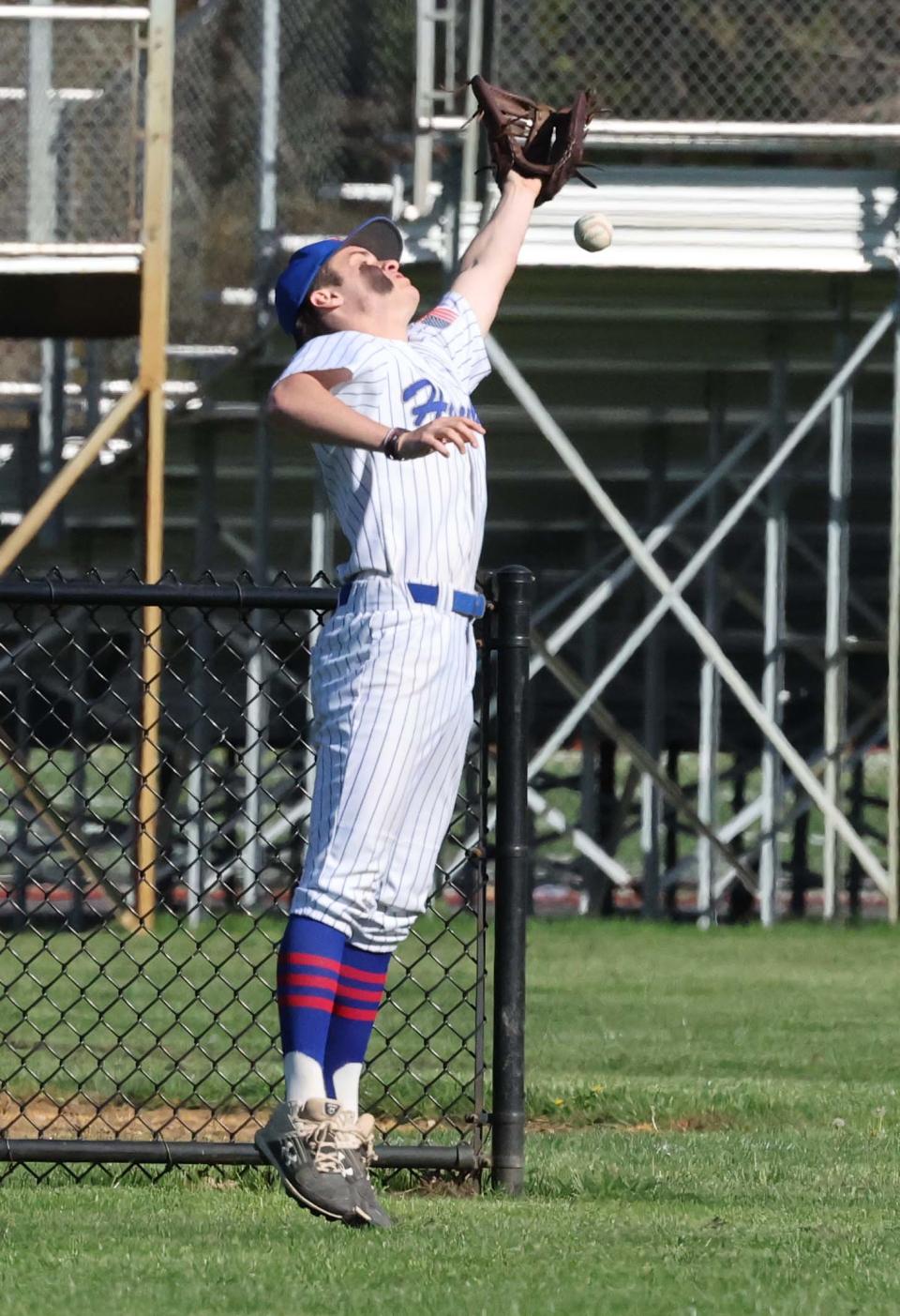 Southeastern left fielder Ryan Desmond can't make the catch off the bat of Norwell's Patrick Higgins for a double during a game on Friday, May 5, 2023. 