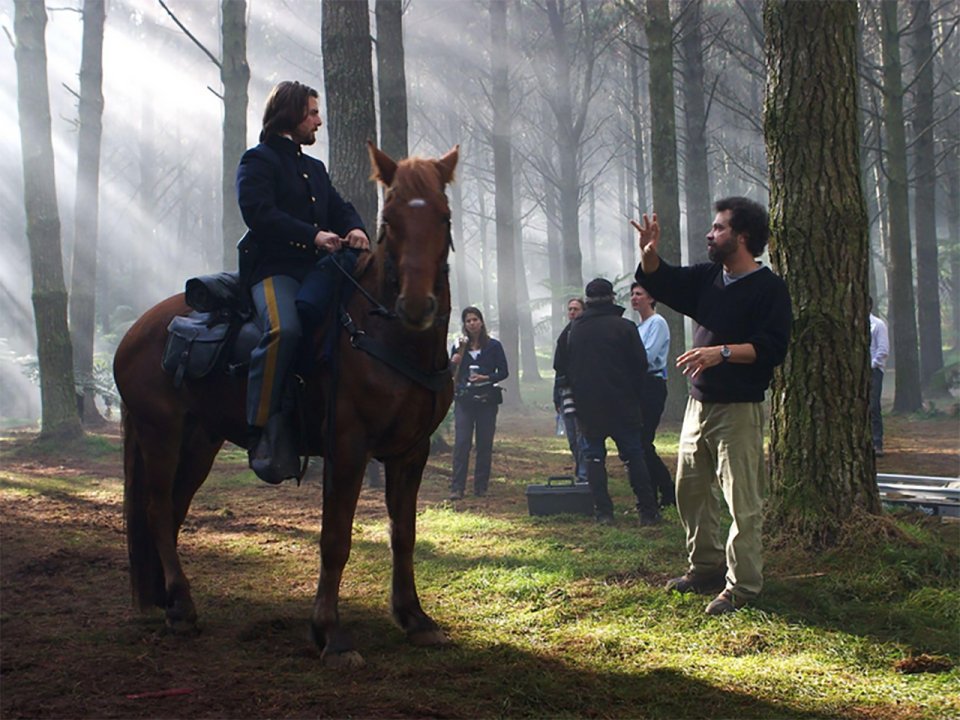 Ed Zwick directing Tom Cruise during filming of 