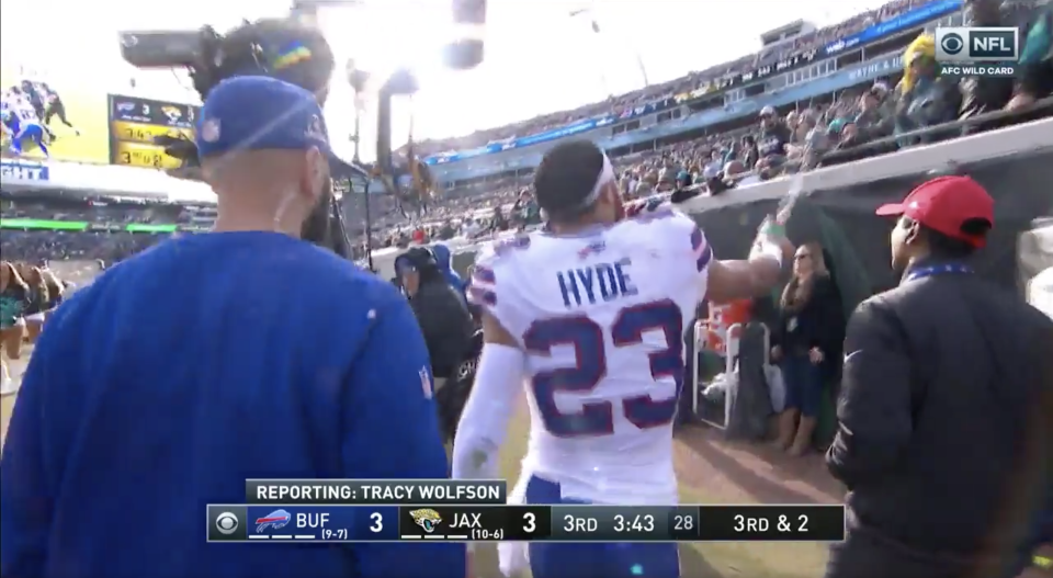 Micah Hyde sprayed some water on a fan as he left the field Sunday. (Twitter.com/TheRenderNFL screen shot)
