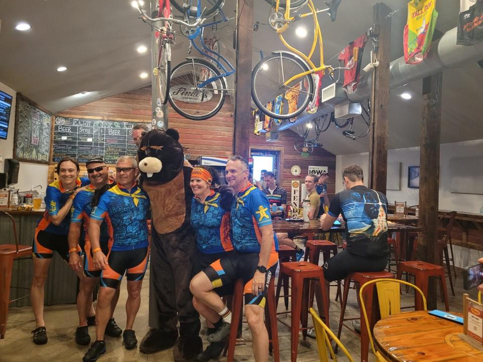 Riders on the RAGBRAI Route Inspection Ride stop by Fenders Brewing in Polk City.