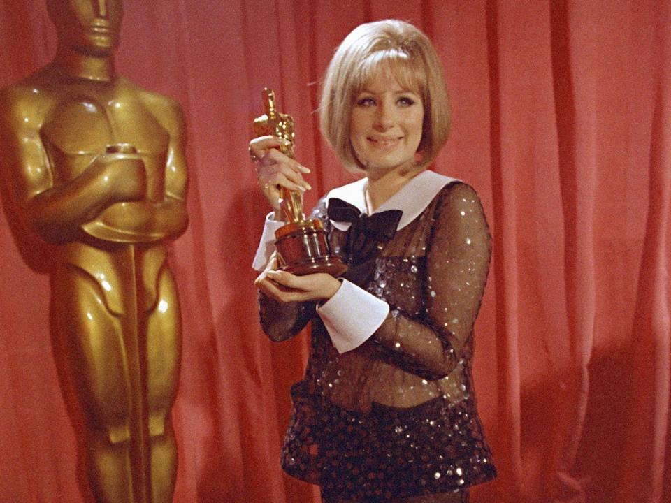 Barbra Streisand with her award at the 1969 Oscars.