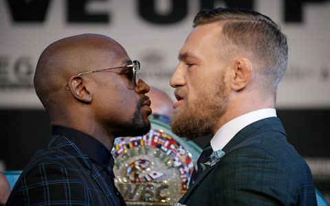 Floyd Mayweather and Conor McGregor - Credit: AP 