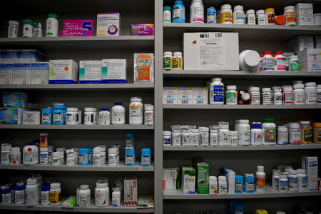 FILE PHOTO - Bottles of medications line the shelves at a pharmacy in Portsmouth, Ohio, June 21, 2017. REUTERS/Bryan Woolston