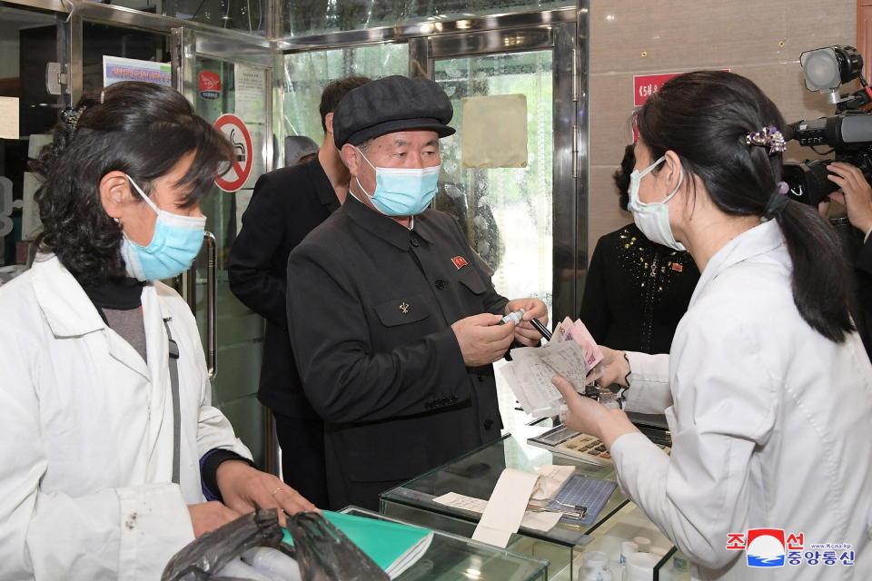 Pak Jong Chon, member of the Presidium of the Political Bureau and secretary of the Central Committee of the Workers' Party of Korea, inspects a pharmacy amid the coronavirus disease (COVID-19) pandemic, in Pyongyang, North Korea, in this undated photo released on May 17, 2022 by North Korea's Korean Central News Agency (KCNA).    KCNA via REUTERS    ATTENTION EDITORS - THIS IMAGE WAS PROVIDED BY A THIRD PARTY. REUTERS IS UNABLE TO INDEPENDENTLY VERIFY THIS IMAGE. NO THIRD PARTY SALES. SOUTH KOREA OUT. NO COMMERCIAL OR EDITORIAL SALES IN SOUTH KOREA.