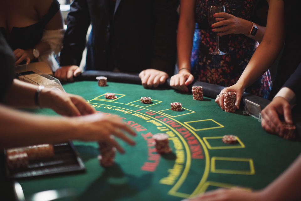 A group of people playing poker