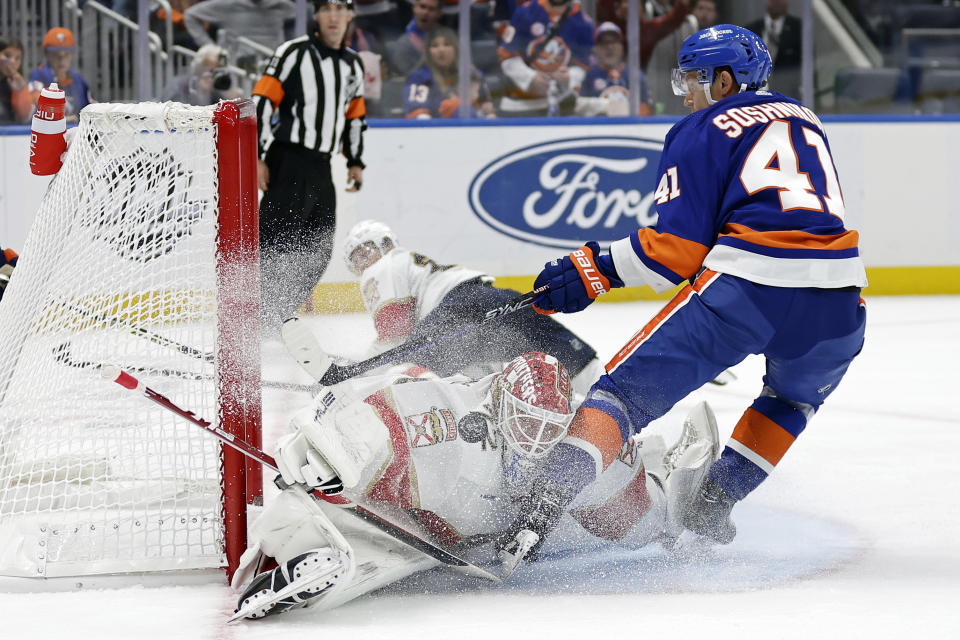 Florida Panthers goaltender Sergei Bobrovsky stops a shot by New York Islanders right wing Nikita Soshnikov (41) during the second period of an NHL hockey game Thursday, Oct. 13, 2022, in Elmont, N.Y. (AP Photo/Adam Hunger)
