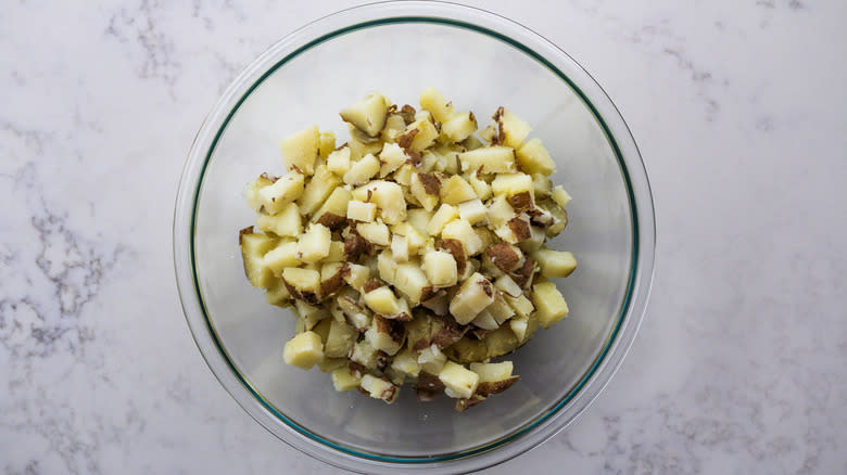 chopped cooked potatoes in bowl
