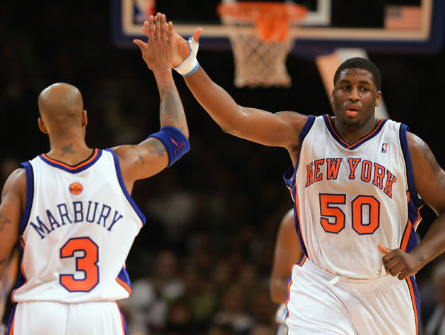 Michael Sweetney and teammate Stephon Marbury. (Getty Images)