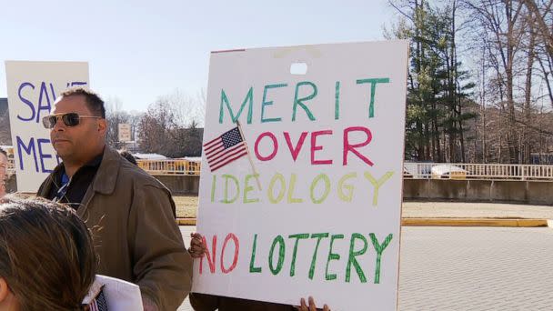 PHOTO: Parents picket about the merit controversy in Fairfax County, Virginia, on Jan. 14, 2023. (WJLA)