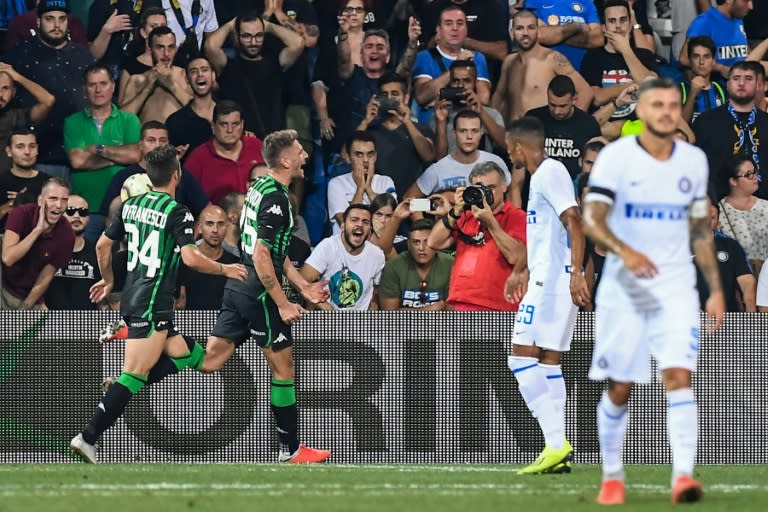Shock: Sassuolo forward Domenico Berardi celebrates scoring the opening goal against Inter Milan