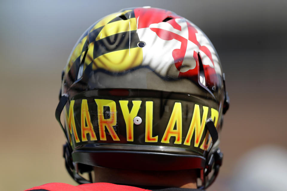A Maryland player wears a helmet emblazoned with the state flag during an NCAA college football game against Richmond, Saturday, Sept. 5, 2015, in College Park, Md. (AP Photo/Patrick Semansky)