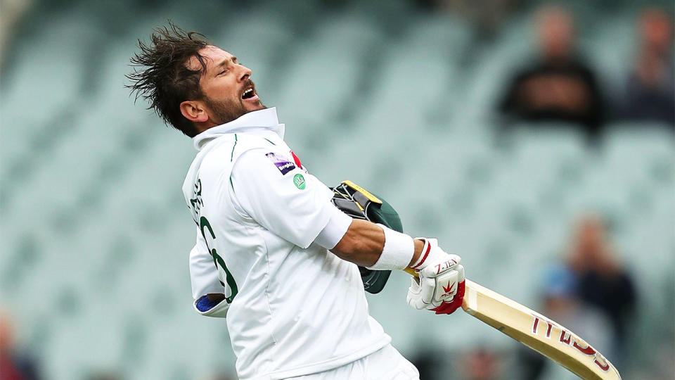 Yasir Shah jumps in the air and celebrates his century during day three of the Test between Australia and Pakistan at the Adelaide Oval.