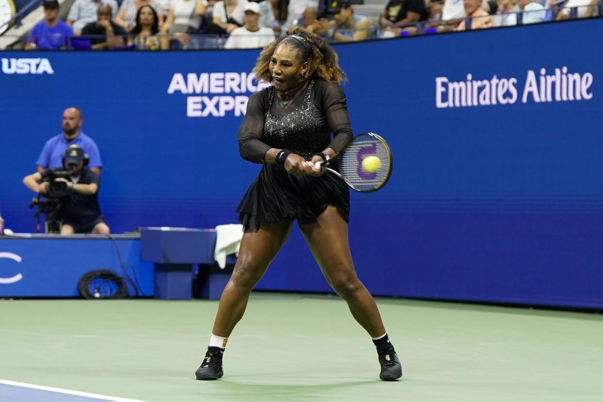 Serena Williams, of the United States, returns a shot to Danka Kovinic, of Montenegro, during the first round of the U.S. Open tennis championship on Monday, Aug. 29, 2022, in New York.