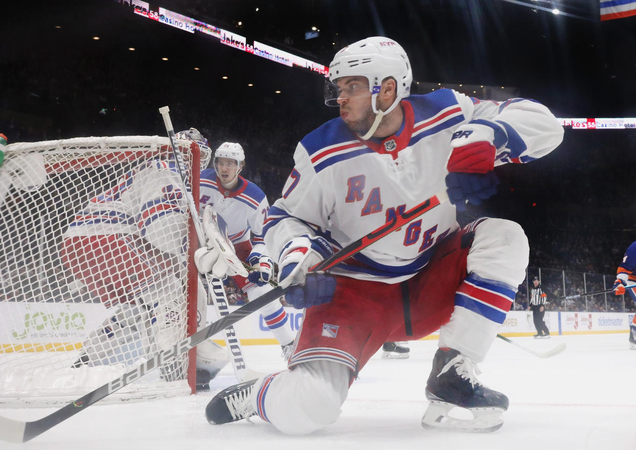 NEW YORK, NEW YORK - FEBRUARY 25: Tony DeAngelo #77 of the New York Rangers skates against the New York Islanders at NYCB Live's Nassau Coliseum on February 25, 2020 in Uniondale, New York. The Rangers defeated the Islanders 4-3 in overtime. (Photo by Bruce Bennett/Getty Images)