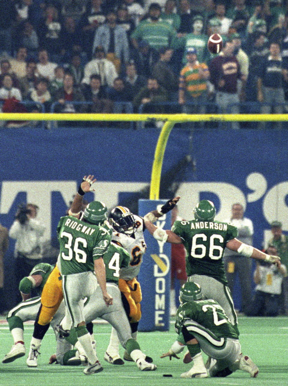 Saskatchewan Roughriders kicker Dave Ridgway kicks the winning field goal during the 1989 Grey Cup game against the Hamilton Tiger Cats in Toronto. (The Canadian Press)