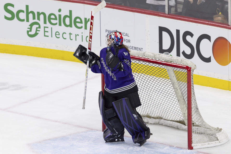 Minnesota goalie Nicole Hensley (29) celebrates the team's win against Toronto in a PWHL hockey game Wednesday, Jan. 10, 2024, in St. Paul, Minn. (AP Photo/Bailey Hillesheim)