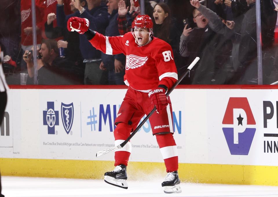 Detroit Red Wings right wing Patrick Kane celebrates his overtime goal against the Columbus Blue Jackets in an NHL hockey game Tuesday, March 19, 2024, in Detroit. (AP Photo/Duane Burleson)