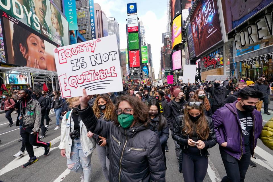 Demonstrators march through Times Square in April, during a rally demanding more inclusion for minorities and the disabled.