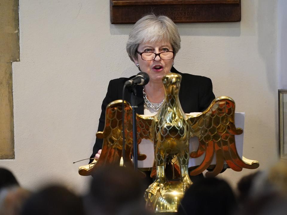 Former PM Theresa May speaks during the service (PA)