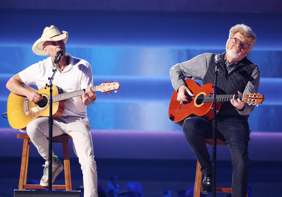 Kenny Chesney and Mac McAnally perform onstage at The 57th Annual CMA Awards at Bridgestone Arena in Nashville, Tennessee on November 8, 2023.