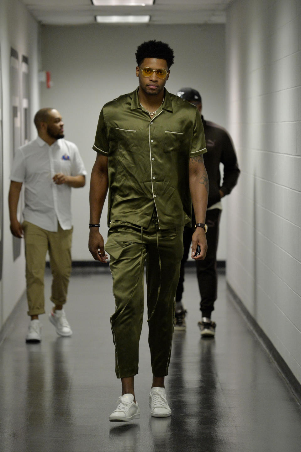 Rudy Gay opts for comfort with a silk dark green combo before the Nuggets, Spurs Game 3 on April 18.