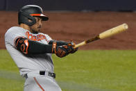 Baltimore Orioles' Anthony Santander follows through on a fourth-inning solo home run off New York Yankees starting pitcher Jameson Taillon in a baseball game Wednesday, April 7, 2021, at Yankee Stadium in New York. (AP Photo/Kathy Willens)