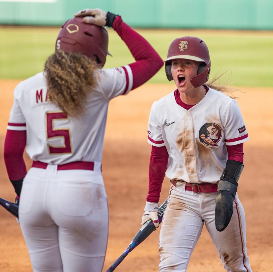 Florida State infielder Josie Muffley (10) shouts after scoring for the Seminoles. Florida State defeated Kennesaw State 6-2 in the first round of the Tallahassee Regionals Friday, May 21, 2021. 