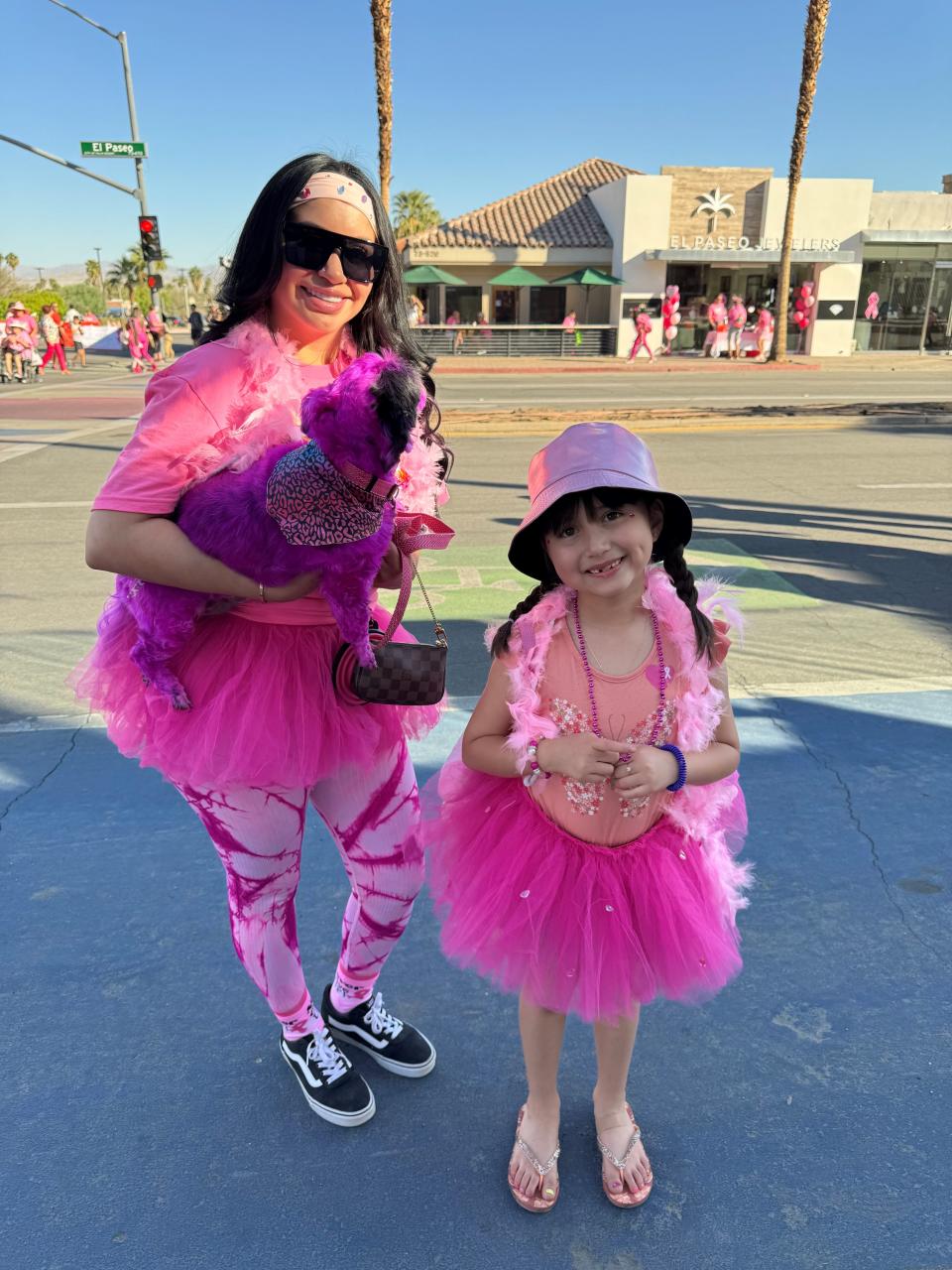 Whitney Alvaroz, with her daughter, Taya, and pup Lola, walked for her mother, Maria, who currently battling cancer.