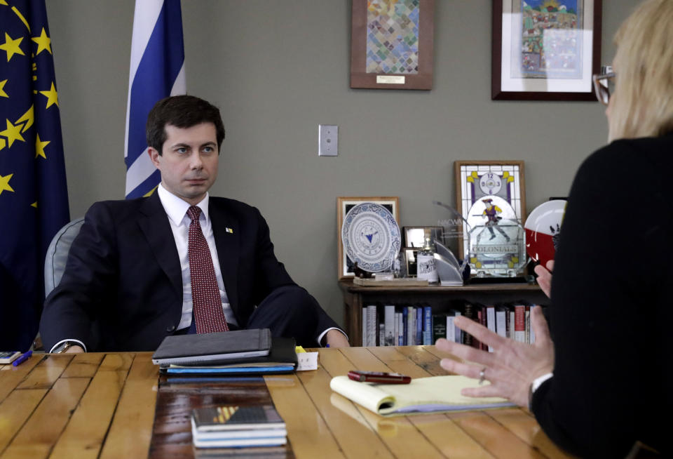 Mayor Pete Buttigieg listens to an AP reporter at his office in South Bend, Ind., Thursday, Jan. 10, 2019. Few people know Pete Buttigieg's name outside the Indiana town where he's mayor, but none of that has deterred him from contemplating a 2020 Democratic presidential bid. He's among the potential candidates who believe 2016 and 2018 showed voters are looking for fresh faces. (AP Photo/Nam Y. Huh)