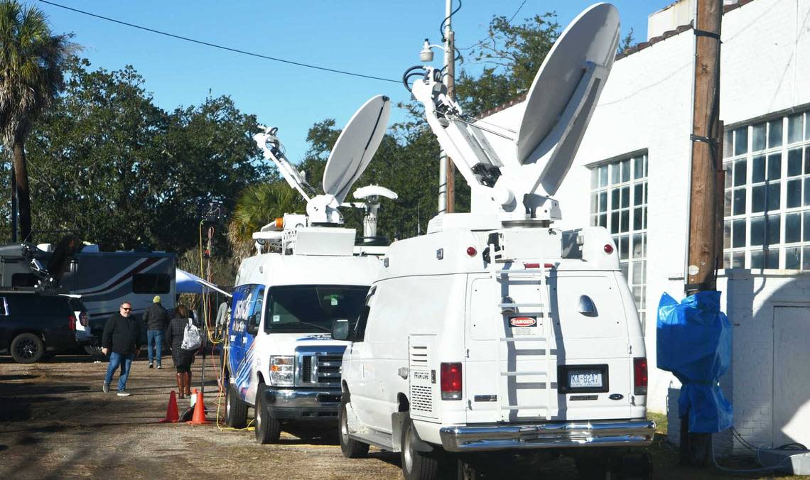 Television crews are set up near the Colleton County Courthouse on Monday, Jan. 23, 2022, while jury selection is underway for the murder trial against Alex Murdaugh in Walterboro, S.C