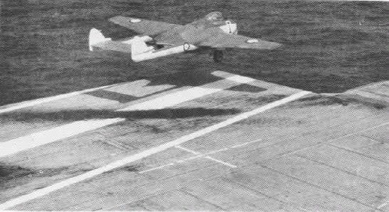 A Sea Vampire makes a touch-and-go landing on the aircraft carrier <em>USS Antietam</em>. The Sea Vampire conducted trials on the angled deck for four days while flying out of Royal Naval Air Station Ford, Sussex, in 1953. <em>U.S. Navy</em>