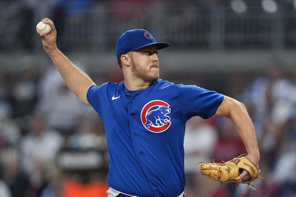 FILE - Chicago Cubs starting pitcher Jameson Taillon delivers to an Atlanta Braves batter in the first inning of a baseball game, Wednesday, Sept. 27, 2023, in Atlanta. Major League Baseball wants to put a greater emphasis on starting pitching. But it’s a tricky situation in the era of openers and hard-throwing relievers. (AP Photo/John Bazemore, File)