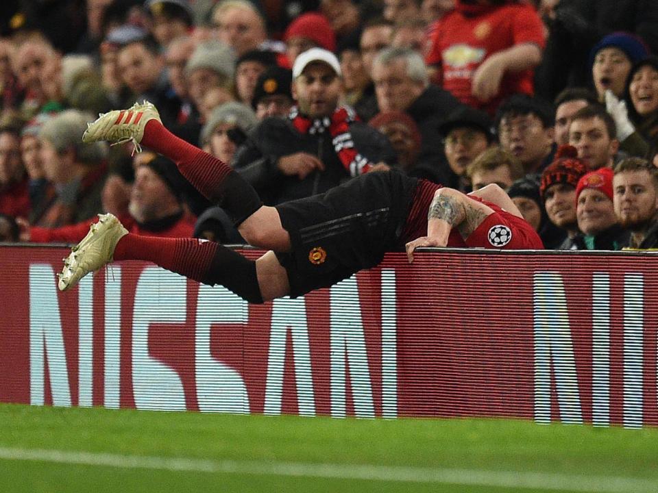 Phil Jones takes a tumble during the first half (AFP/Getty Images)