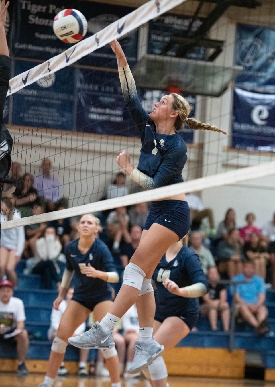 Izzy Beech (7) plays the ball during the Navarre vs Gulf Breeze volleyball match at Gulf Breeze High School on Thursday, Sept. 28, 2023.