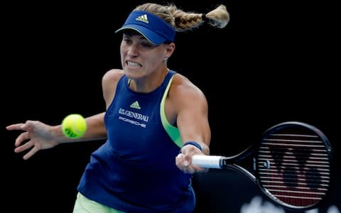 Germany's Angelique Kerber hits a forehand return to Russia's Maria Sharapova during their third round match at the Australian Open tennis championships in Melbourne, Australia, Saturday, Jan. 20, 2018 - Credit: AP