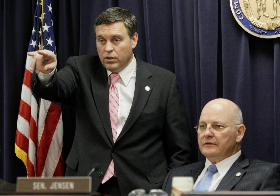 Rep. John Tilley, D-Hopkinsville, left, and Senate Judiciary Committee chairman Tom Jensen, R-London, looked at prospective speakers before a committee meeting that approved a prison-reform bill. AP