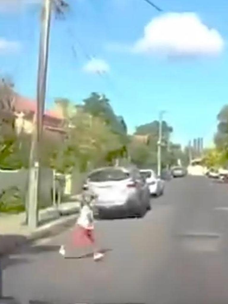 The driver had a split second to slam on the breaks before hitting the little girl. Photo: Facebook/DashCam Owners Australia