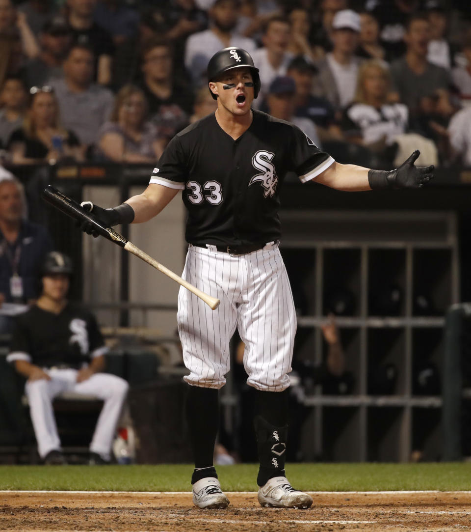 Chicago White Sox's James McCann (33) reacts to being called out by the the first base umpire to end the fourth inning against the Minnesota Twins on Thursday, July 25, 2019, in Chicago. (AP Photo/Jeff Haynes)