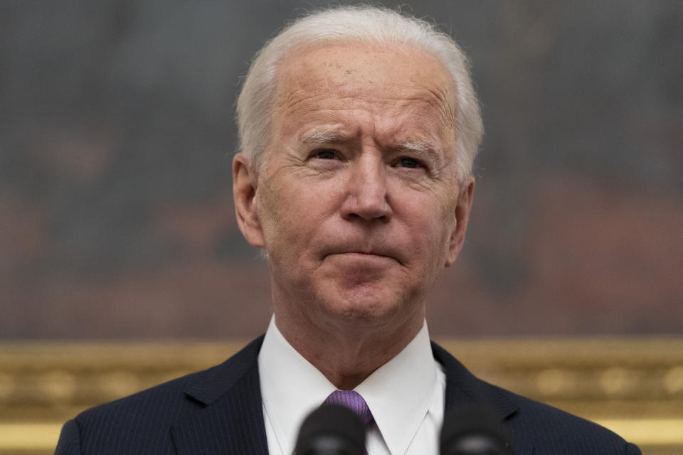 President Joe Biden speaks about the coronavirus in the State Dinning Room of the White House, Thursday, Jan. 21, 2021, in Washington. Experts say Biden's pledge to undo his predecessor's anti-regulatory policies on the environment won't be accomplished easily, despite a fast start. After taking office last week, Biden returned the U.S. to the Paris climate accords, revoked the Keystone oil pipeline’s federal permit and halted oil and gas leasing in the Arctic National Wildlife Refuge. (AP Photo/Alex Brandon)