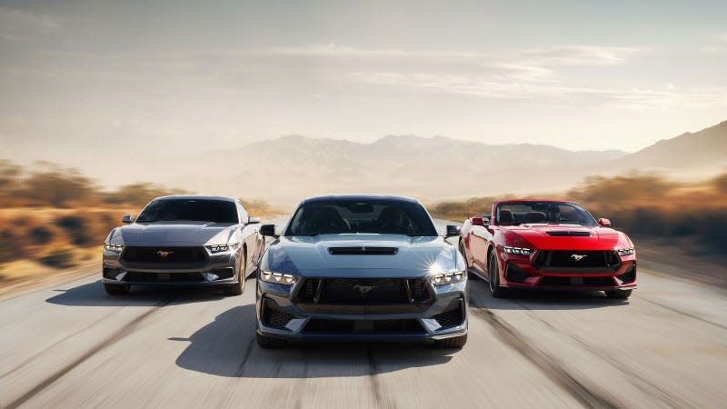 A photo of three 2024 Ford Mustang cars. 