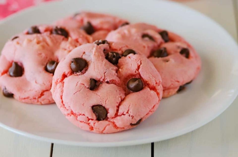 <p>The Country Cook</p><p>These pretty pastel pink strawberry cookies come together using boxed cake mix.</p><p><strong>Get the recipe: <a href="https://www.thecountrycook.net/strawberry-chocolate-chip-cookies/" rel="nofollow noopener" target="_blank" data-ylk="slk:Strawberry Chocolate Chip Cake Mix Cookies;elm:context_link;itc:0;sec:content-canvas" class="link ">Strawberry Chocolate Chip Cake Mix Cookies</a></strong></p>