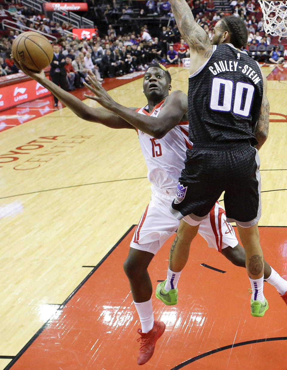 Houston Rockets center Clint Capela, left, shoots as Sacramento Kings center Willie Cauley-Stein defends during the first half of an NBA basketball game, Saturday, March 30, 2019, in Houston. (AP Photo/Eric Christian Smith)