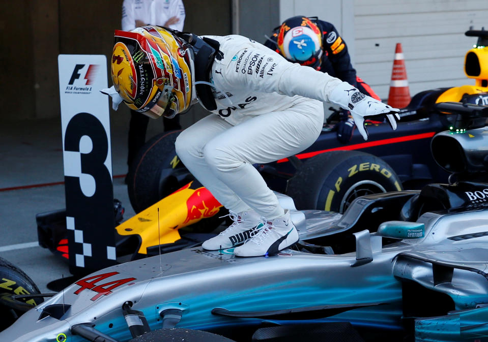 <p>Formula One F1 – Japanese Grand Prix 2017 – Suzuka Circuit, Japan – October 8, 2017. Mercedes’ Lewis Hamilton of Britain celebrates winning the race. REUTERS/Toru Hanai</p>