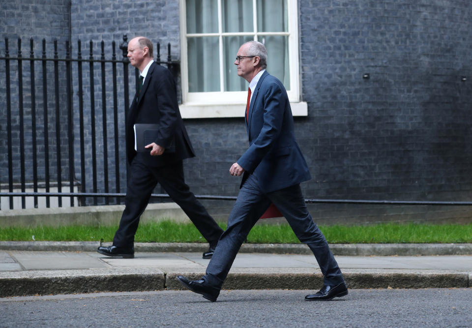 Chief Medical Officer for England, Chris Whitty and UK Government Chief Scientific Adviser Sir Patrick Vallance arrive on Downing Street after British Prime Minister Boris Johnson was moved to intensive care as his coronavirus (COVID-19) symptoms worsened and Secretary of State for Foreign affairs Dominic Raab was asked to deputise, London, Britain, April 7, 2020. REUTERS/Simon Dawson