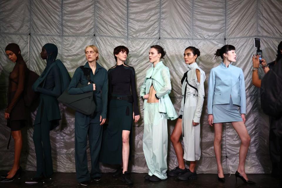 topshot models pose back stage ahead of the catwalk presentation by fashion east for their autumnwinter 2024 collection, during london fashion week in london, on february 16, 2024 photo by henry nicholls  afp photo by henry nichollsafp via getty images